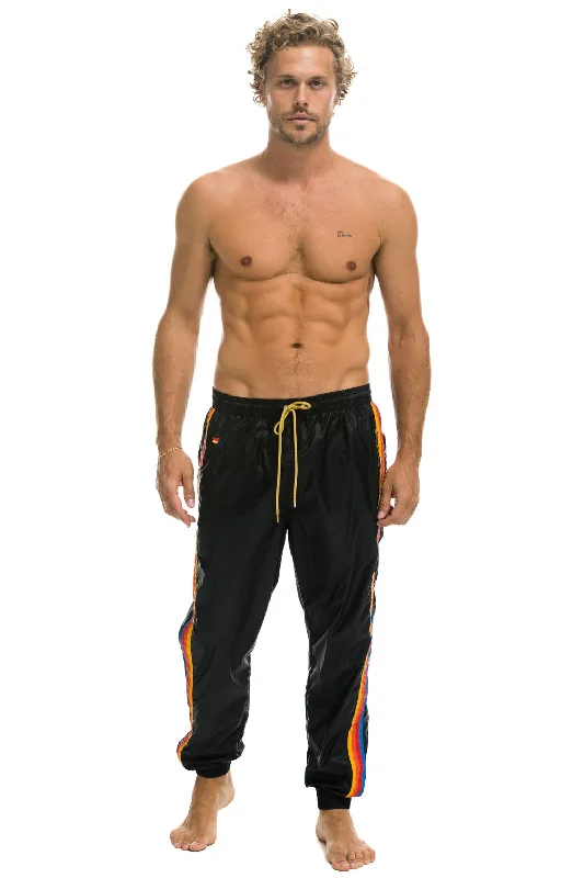 LeggingsMEN'S 4 STRIPE WIND PANT - BLACK